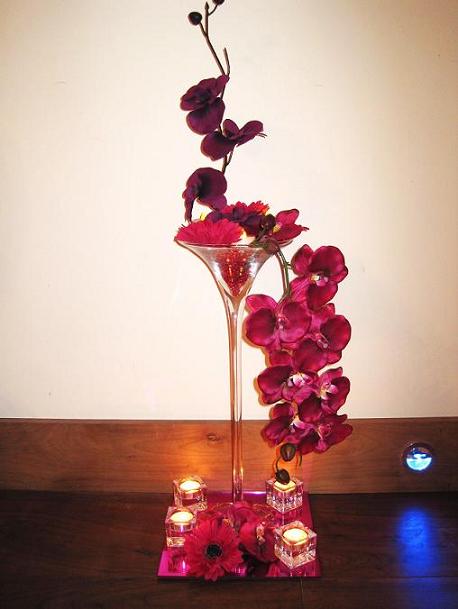 Martini Glass centerpiece created using silk and real touch orchids 