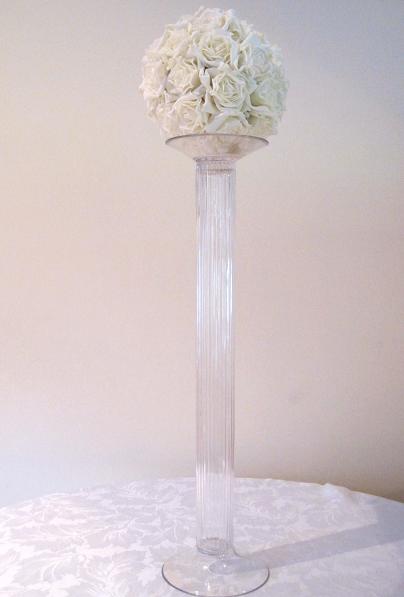 glass pillar arrangement with ivory rose ball